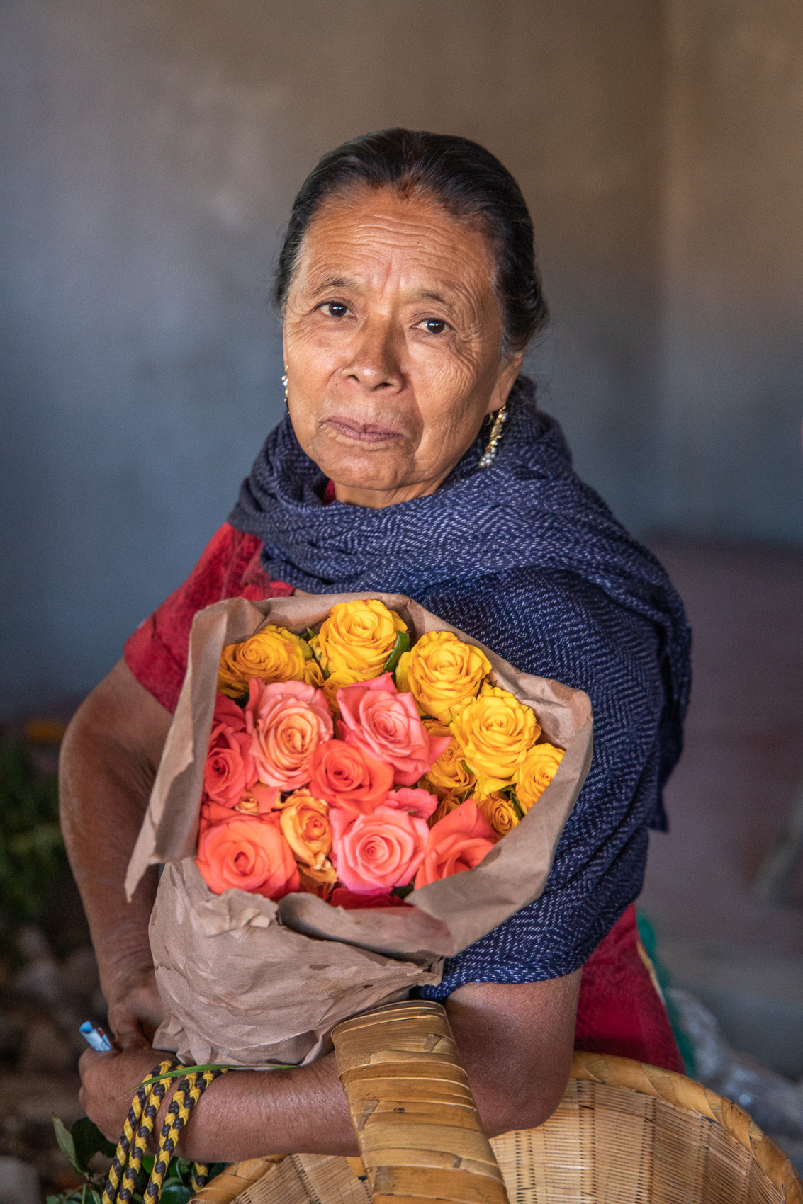 Mexico-Oaxaca-Teotitlan-Woman-Flowers